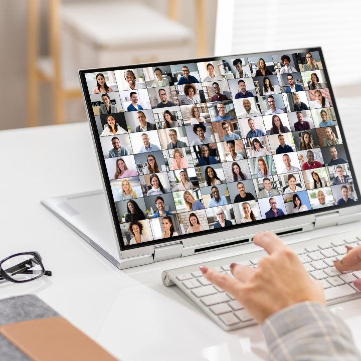 Computer screen with lots of people in a virtual meeting